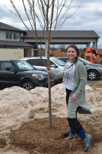 Avail Senior Living | Associate planting trees