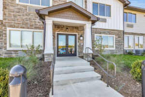 Avail Senior Living | Exterior side door entrance with stairs
