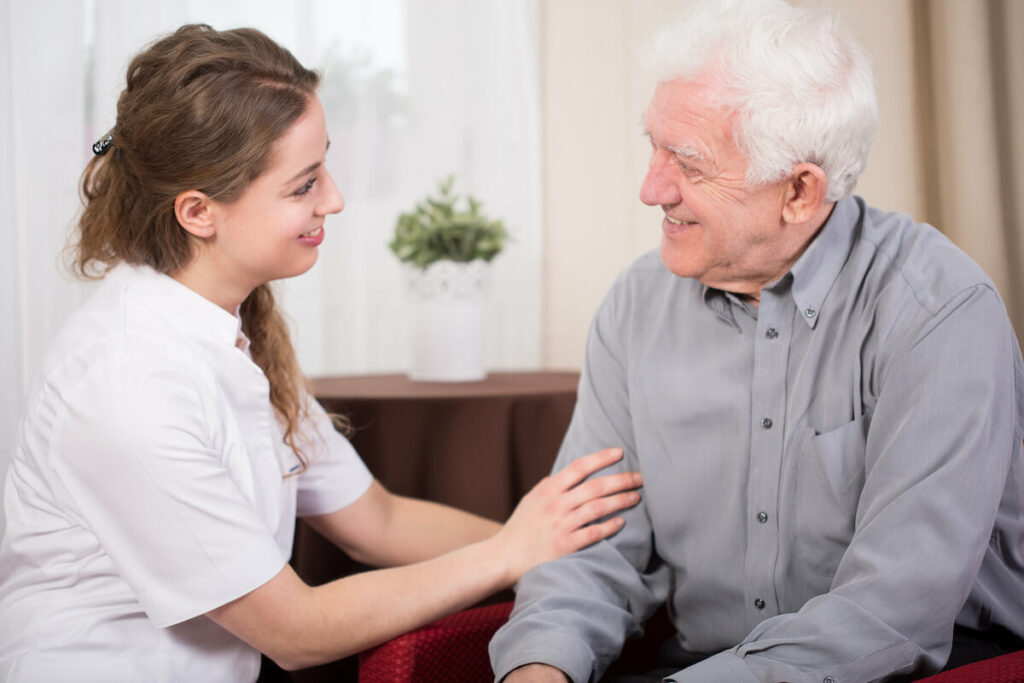 Avail Senior Living | Caregiver comforting a senior man