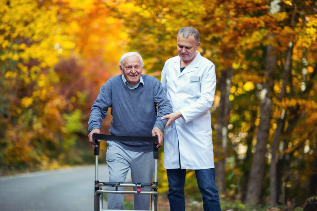 Avail Senior Living | Senior man and his caregiver going on a walk