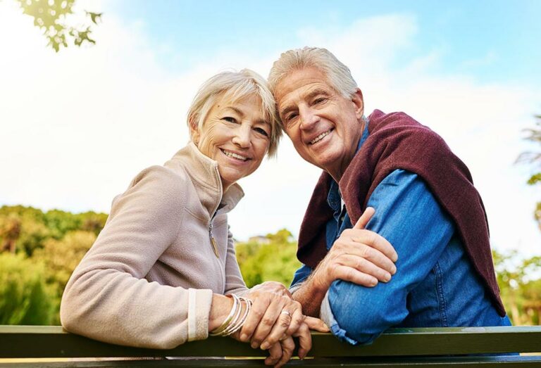 Avail Senior Living | Happy senior couple sitting outside together