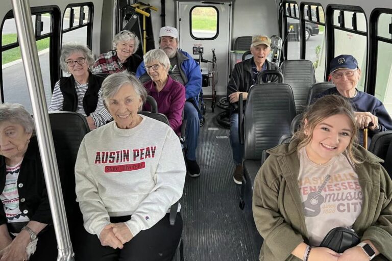 Avail Senior Living | Happy seniors on a bus