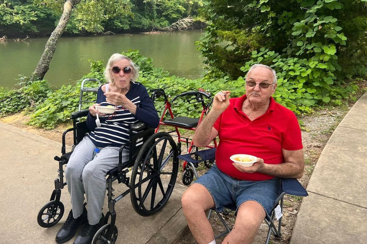 Avail Senior Living | Seniors sitting next to the lake