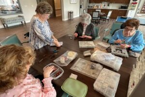 Avail Senior Living | Residents making crafts