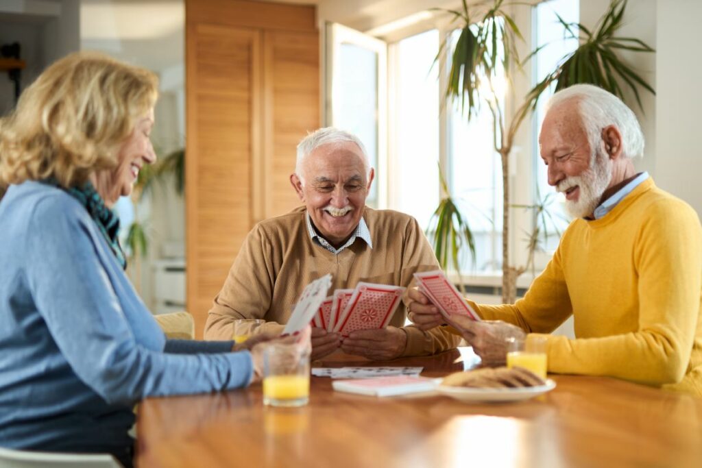 Avail Senior Living | Seniors playing cards together