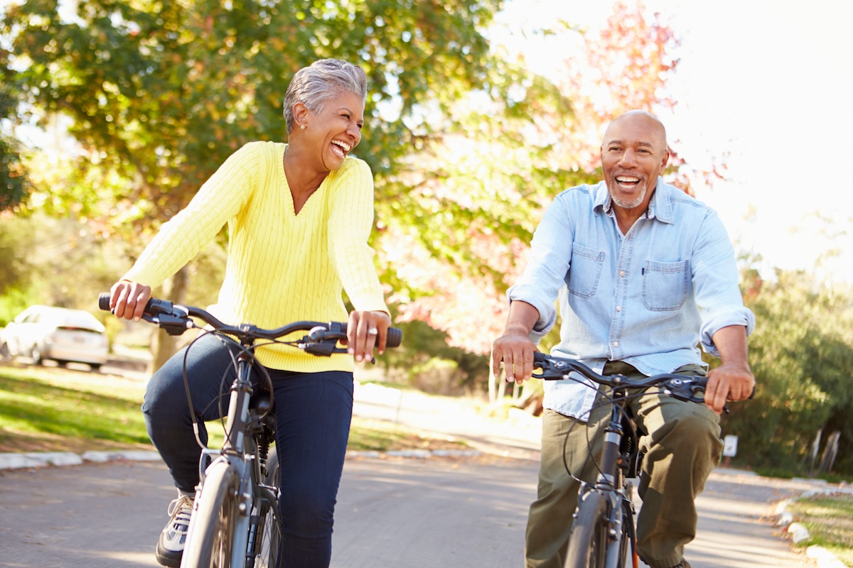 Avail Senior Living | Senior couple on bikes